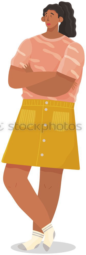 Woman with monkey mask posing against a yellow background